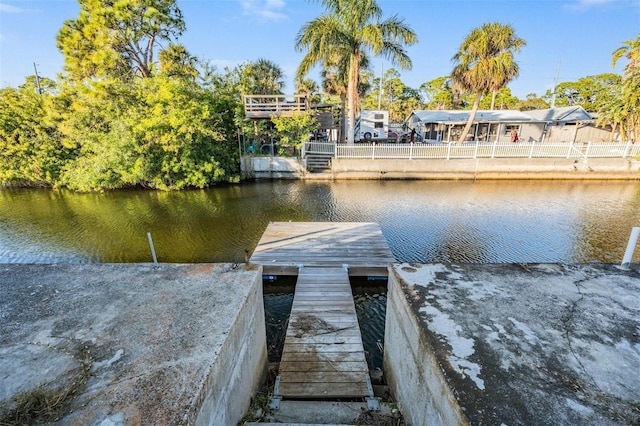 view of dock with a water view