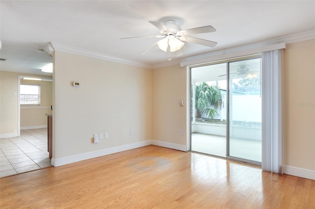 unfurnished room with light hardwood / wood-style floors, ornamental molding, and ceiling fan