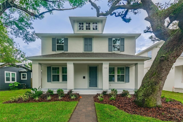 view of front of home featuring a porch and a front yard