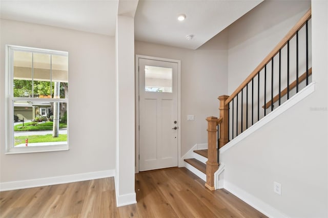 entryway with light hardwood / wood-style flooring