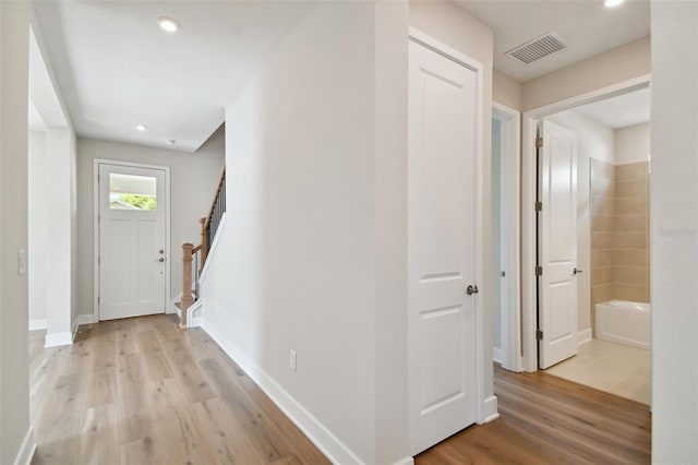 hall featuring light wood-type flooring