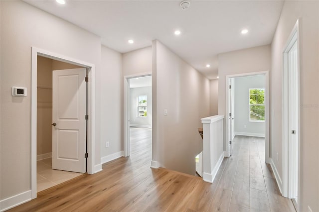 hallway featuring light hardwood / wood-style flooring