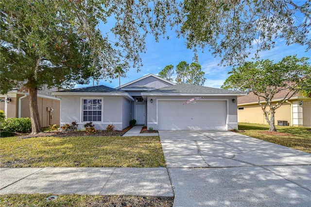 single story home with a garage, a front lawn, and central air condition unit