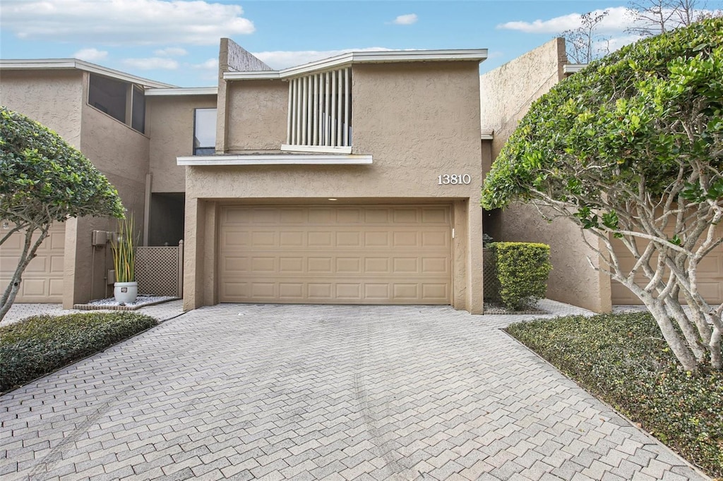 view of front of property featuring a garage