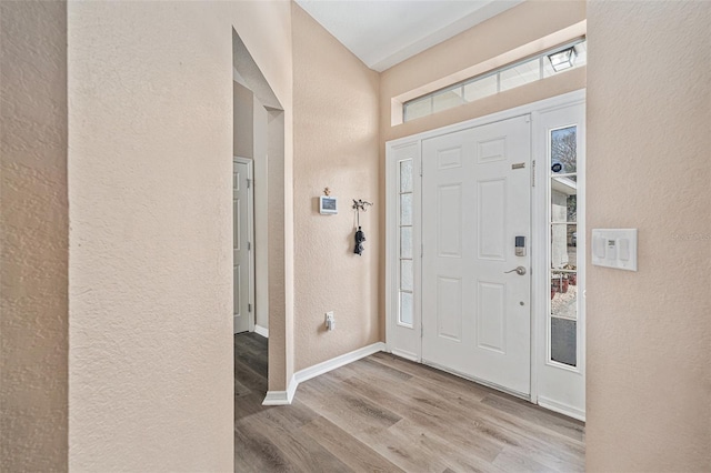 entrance foyer featuring light wood-type flooring