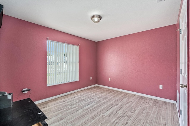 empty room featuring light hardwood / wood-style flooring