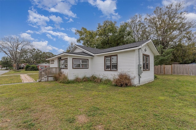 exterior space with a front yard