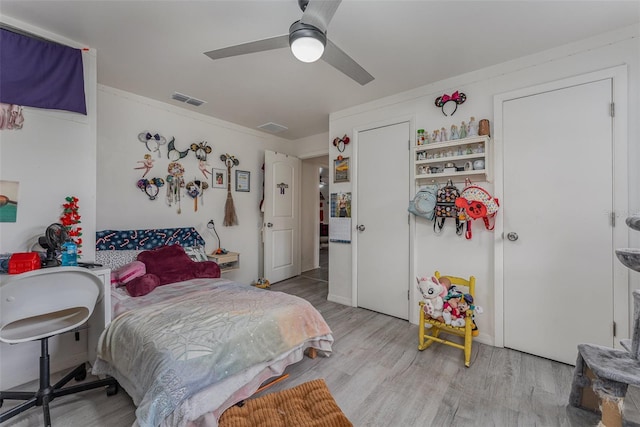 bedroom featuring ceiling fan and light hardwood / wood-style floors