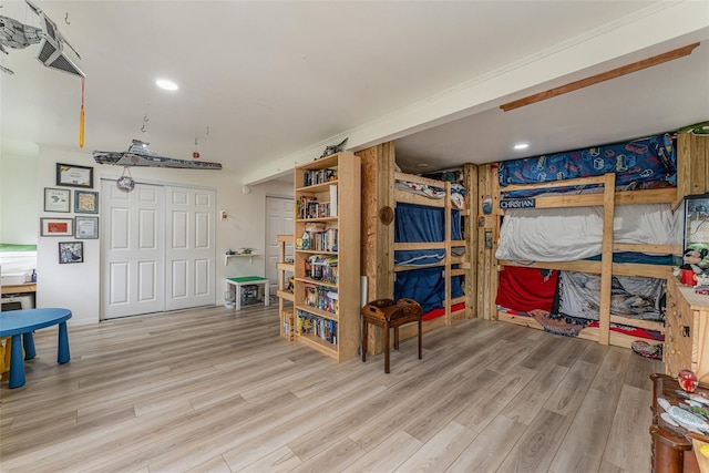 bedroom with light hardwood / wood-style floors