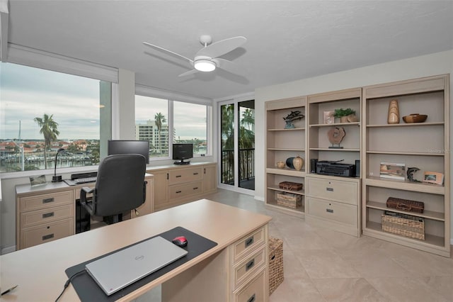 home office featuring ceiling fan