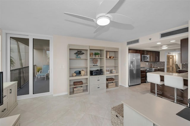 living room with ceiling fan