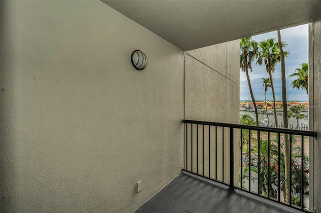 balcony featuring a water view