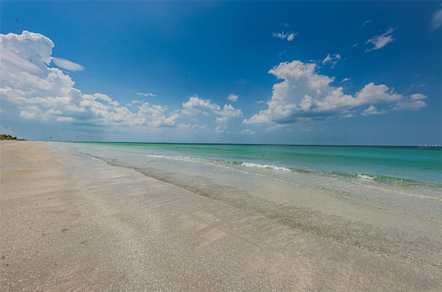 view of water feature with a beach view