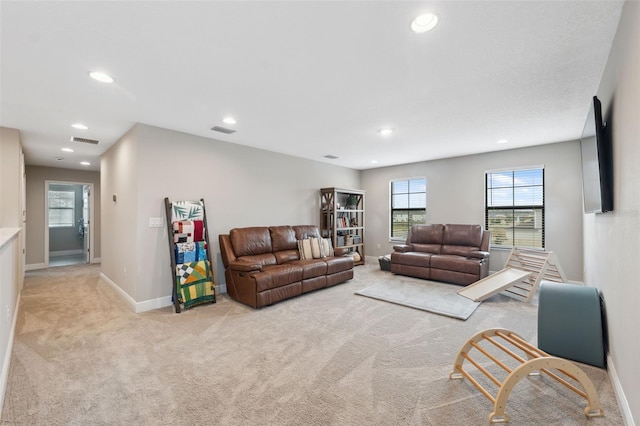 living room with light colored carpet