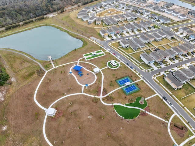 birds eye view of property featuring a water view