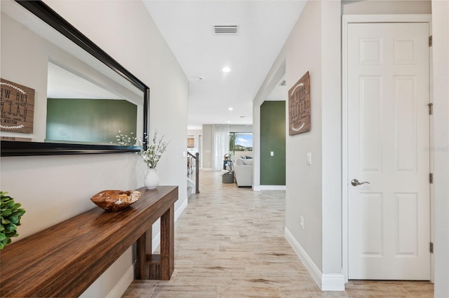 14786 Horse Trot Rd, Lithia, FL 33547 - hallway featuring baseboards, light wood-style flooring, and recessed lighting