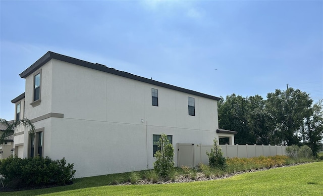 14786 Horse Trot Rd, Lithia, FL 33547 - view of side of home featuring stucco siding