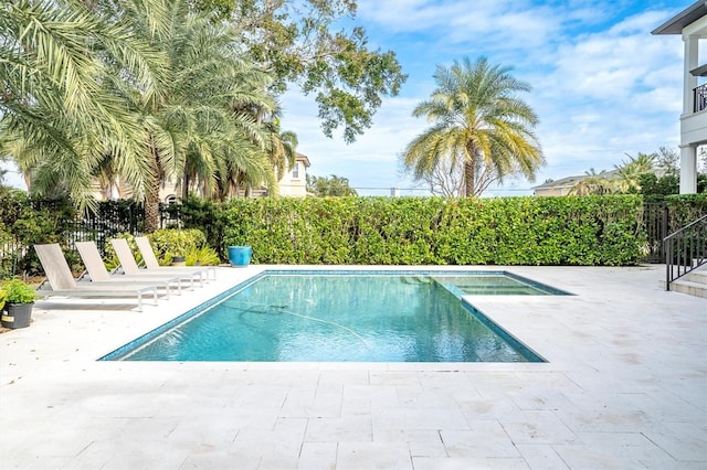 view of pool with a patio area