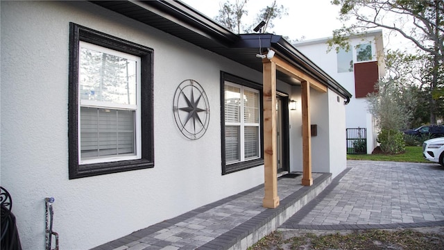 view of property exterior featuring a patio area