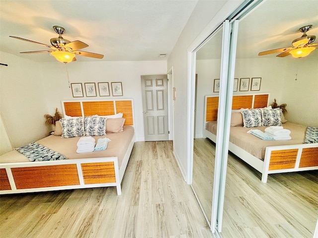 bedroom featuring ceiling fan and wood-type flooring