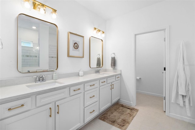 bathroom featuring tile patterned floors and vanity