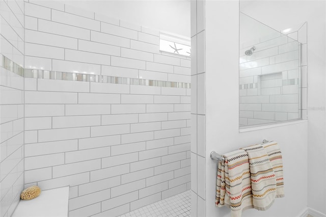 bathroom featuring tiled shower