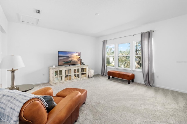 living room featuring light carpet