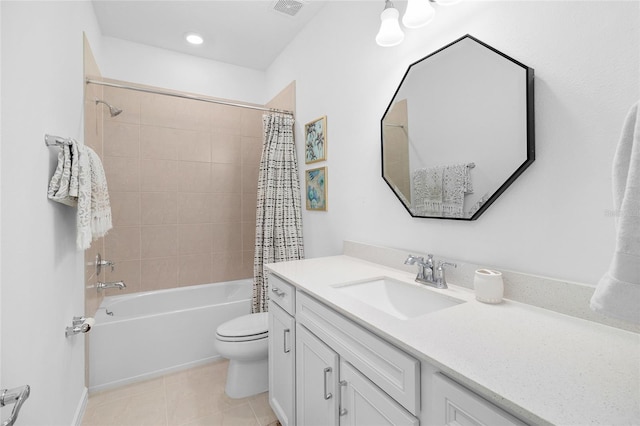 full bathroom with shower / bath combo with shower curtain, tile patterned floors, toilet, and vanity