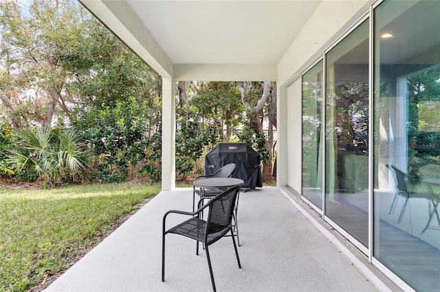 view of patio featuring a grill