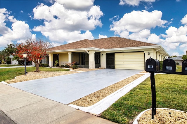 view of front facade with a front lawn and a garage