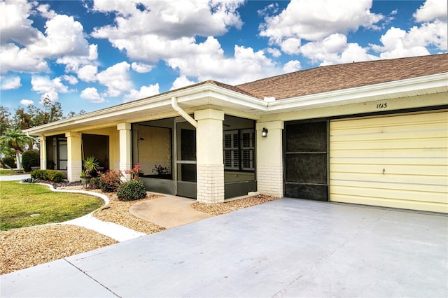 view of front of property with a garage