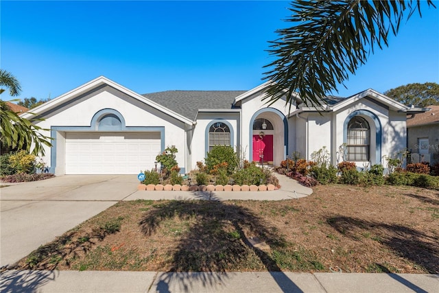 ranch-style home featuring a garage