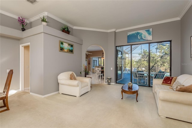 carpeted living room featuring crown molding