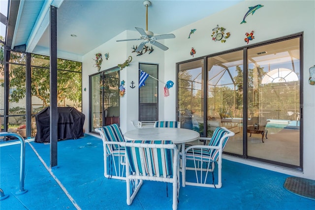 sunroom / solarium with ceiling fan