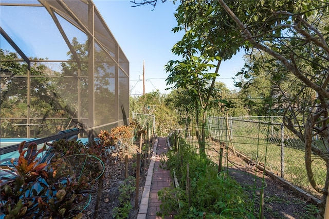 view of yard with a lanai