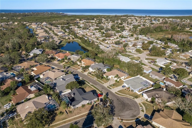 drone / aerial view featuring a water view