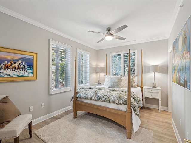 bedroom featuring crown molding, ceiling fan, and light wood-type flooring