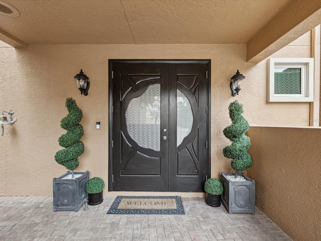 property entrance with french doors