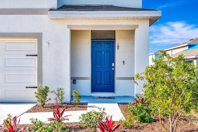 entrance to property with a garage