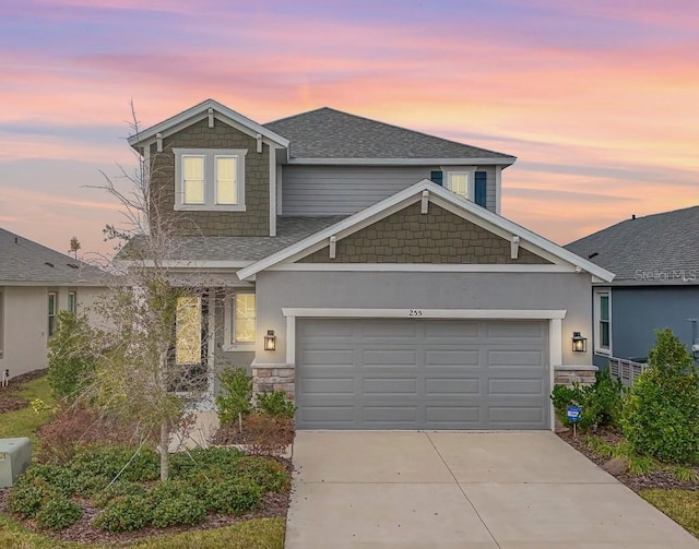 view of front of home with a garage