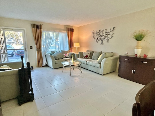 living room with light tile patterned floors