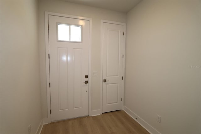 doorway to outside featuring light wood-type flooring