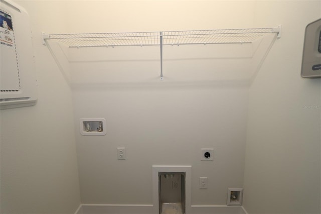 washroom with washer hookup and electric dryer hookup