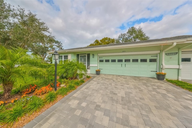 view of front of home with a garage