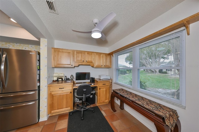 tiled office with ceiling fan