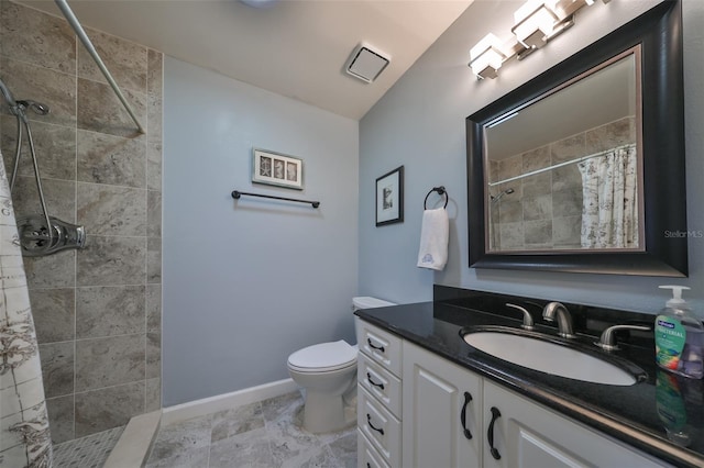 bathroom with toilet, vanity, lofted ceiling, and curtained shower