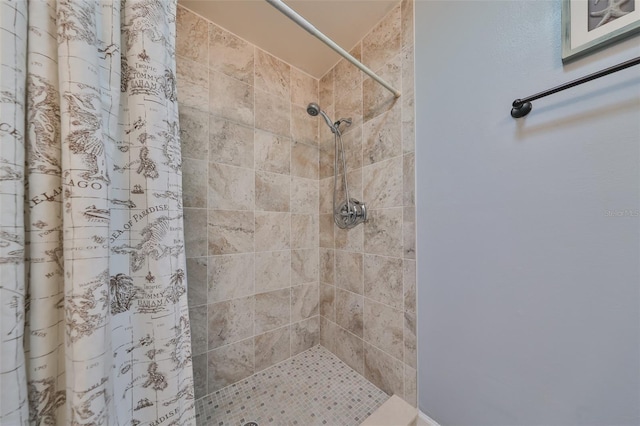 bathroom with curtained shower