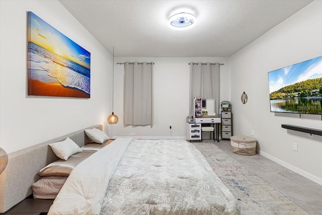 bedroom featuring a textured ceiling