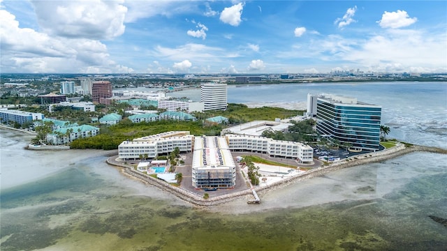 aerial view featuring a water view and a view of the beach