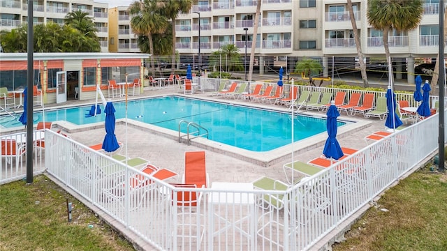 view of swimming pool featuring a patio